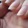 Why do cracks appear on gel nail coating?